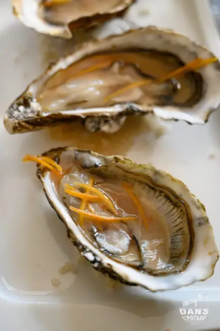 Huîtres en vinaigrette chaude de pamplemousse